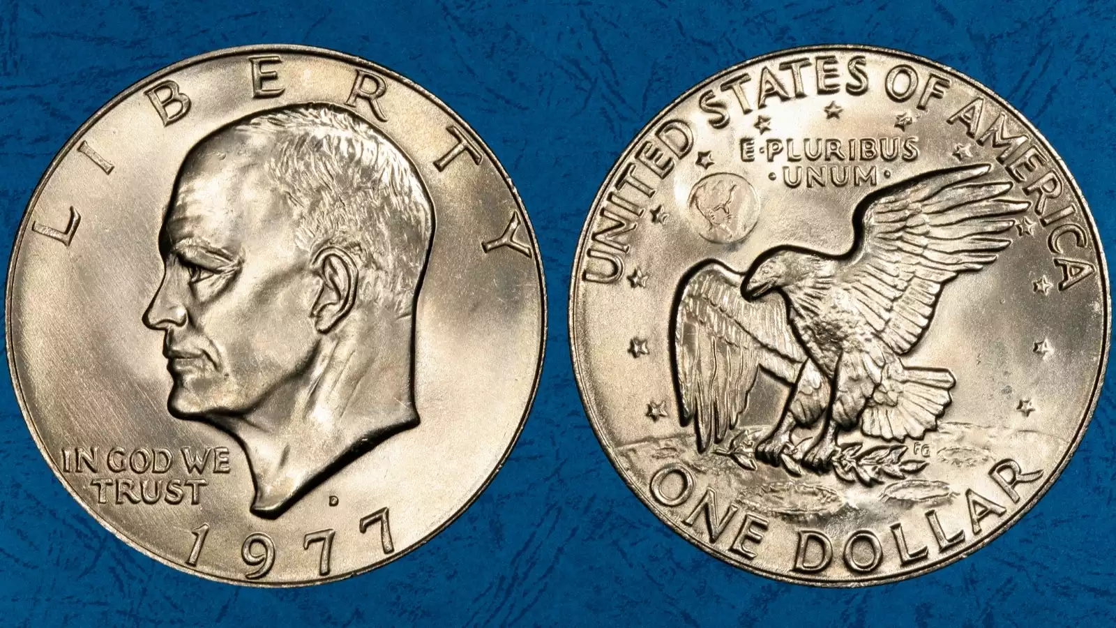 Gem quality 1977-D Eisenhower dollar in MS67 condition showing full cartwheel luster and minimal contact marks
